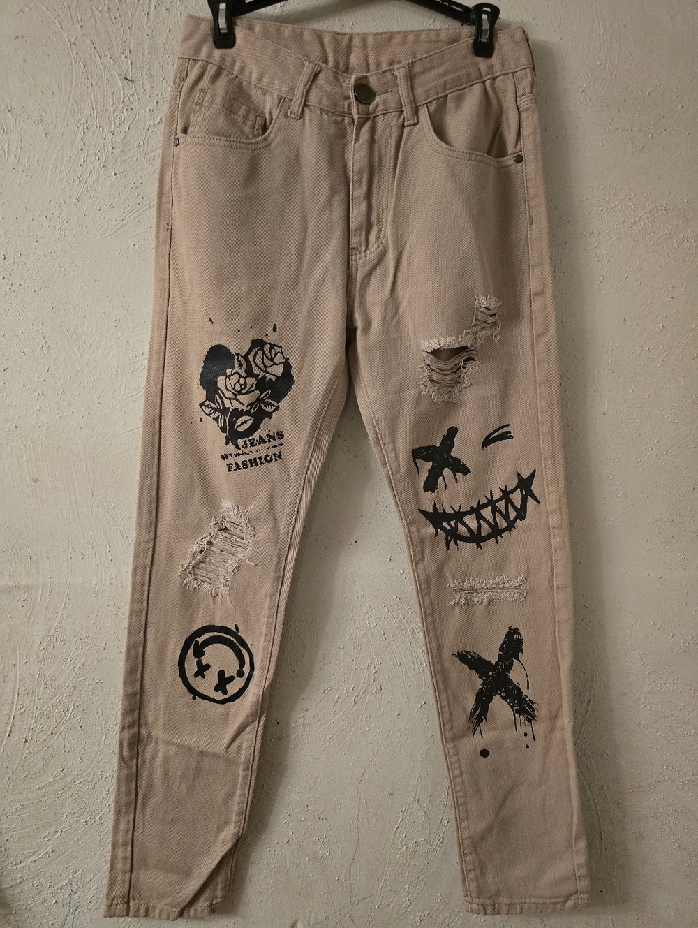 Straight-Leg Beige Women’s Jeans with Black Graphic Accents